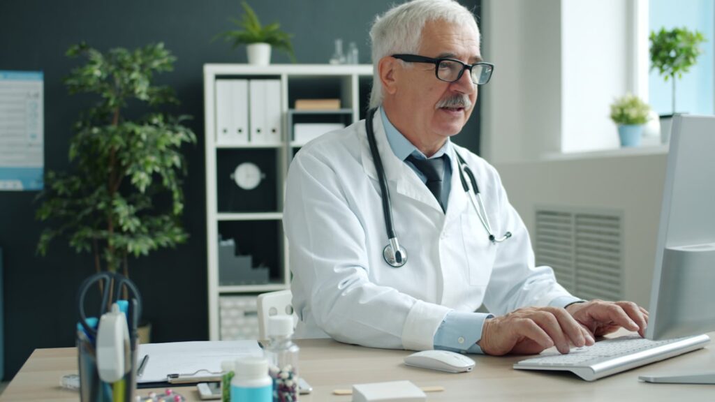 Insurance company verifying medical prescription documents