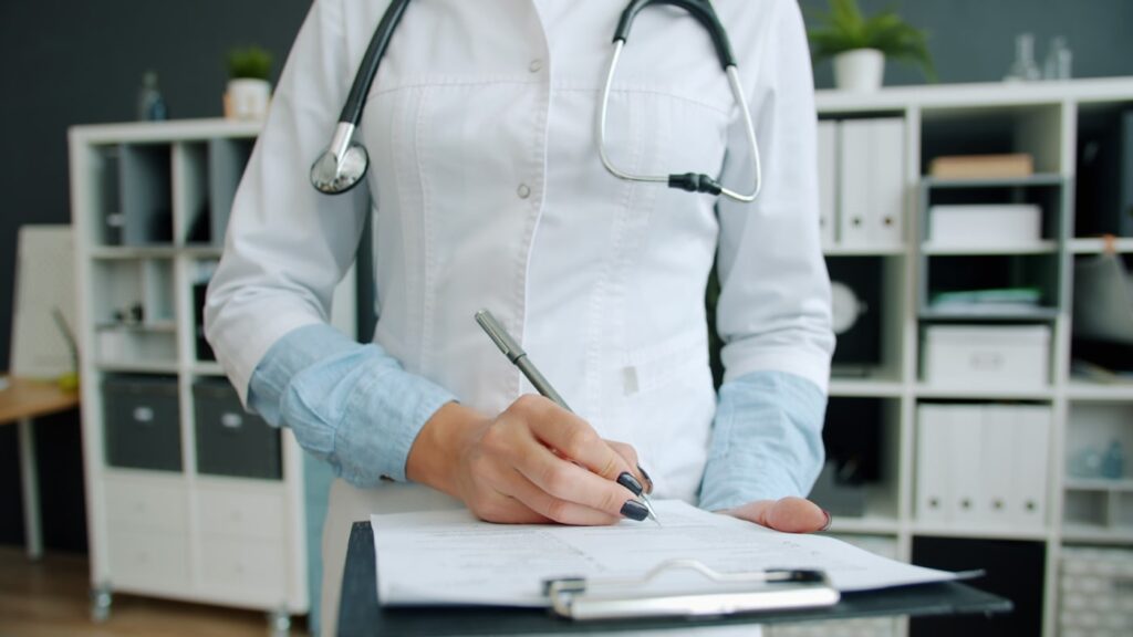 Insurance company reviewing ambulance transport documents