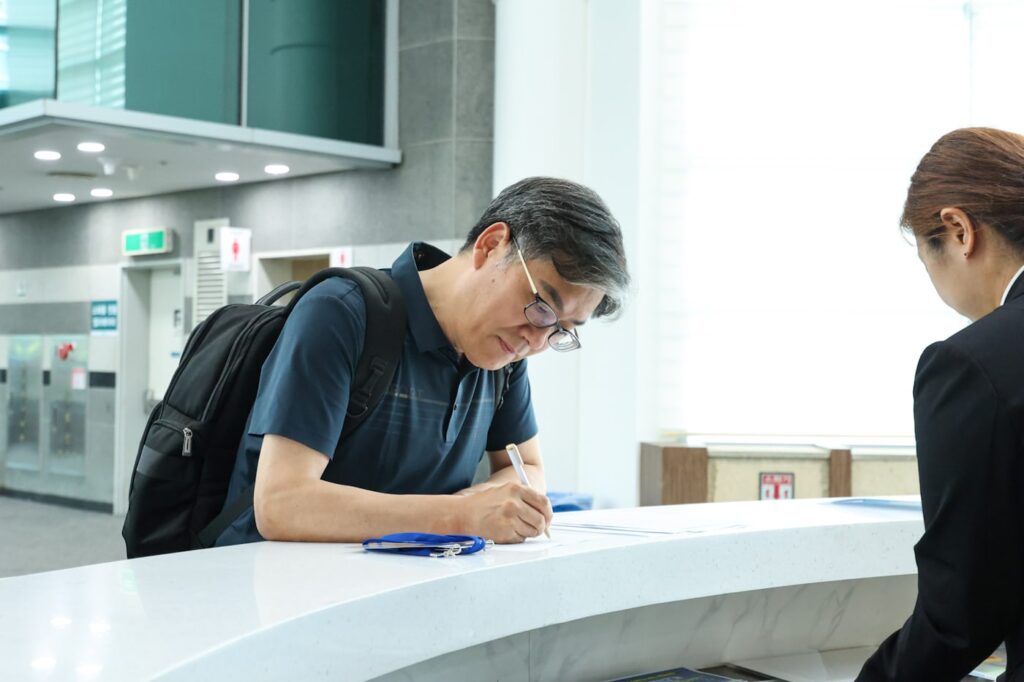Hospital administration reviewing documents for health insurance claim verification