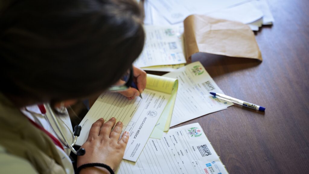 Insurance company reviewing health insurance claim documents